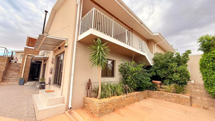 For Sale: Guest House in Suiderhof with 8 ensuite bedrooms, pool, and secure parking.