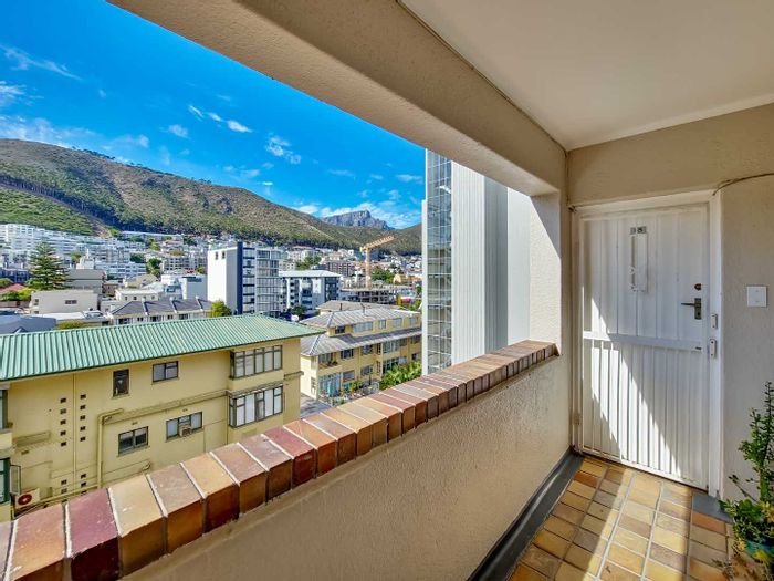 Sea Point Corner Apartment with Parquet Floors, Open Balcony, and Modern Kitchen – For Sale