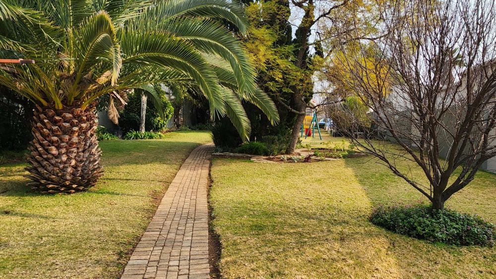 Lush green well maintained park centered inside the complex.