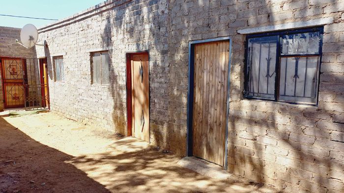 8-Bedroom House in Orange Farm For Sale, Ideal for Rental Income and Convenience.