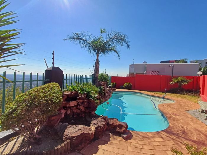 For Sale: Apartment in Northcliff with pool, garage, and balcony views.