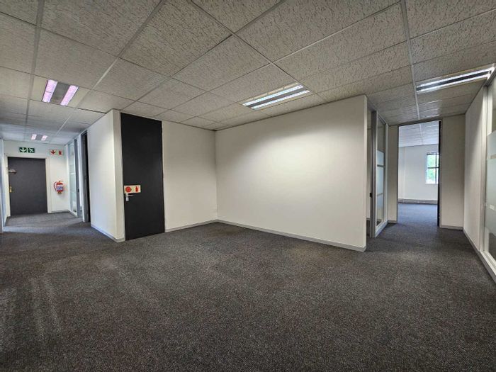 Bryanston Office To Rent: 469sqm, private kitchen, 24-hour security, parking options.