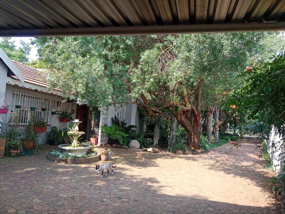 View to the gate entrance under the carport