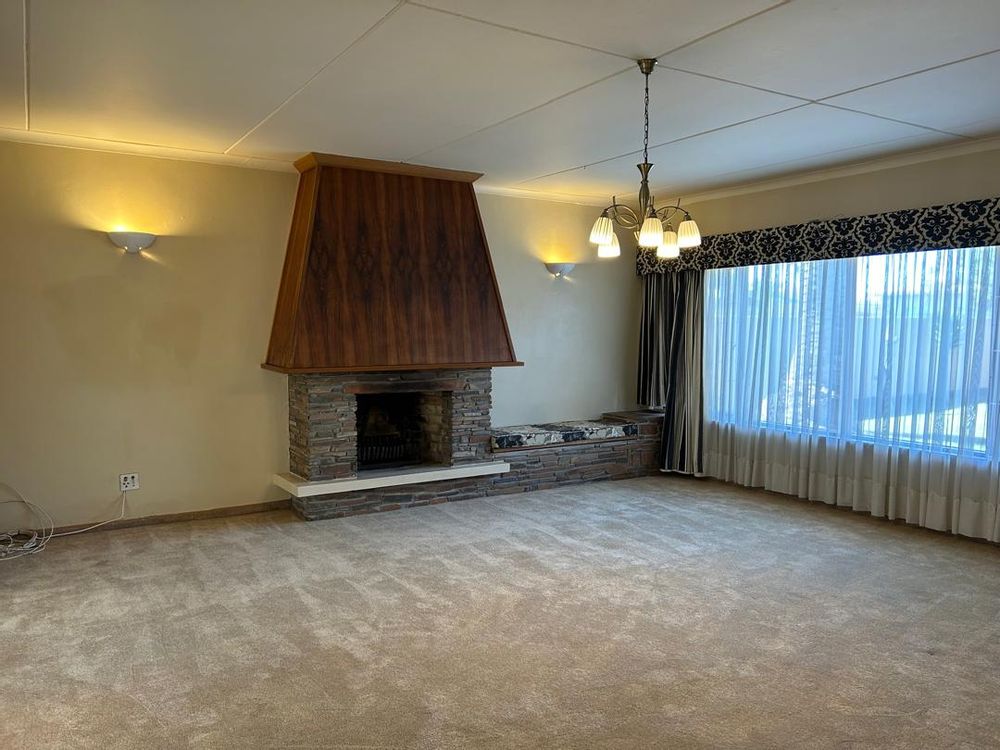 TV room with fireplace 