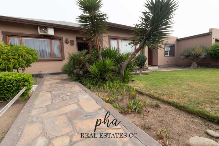 For Sale: House in Swakopmund Central with income-generating flats and business rights.