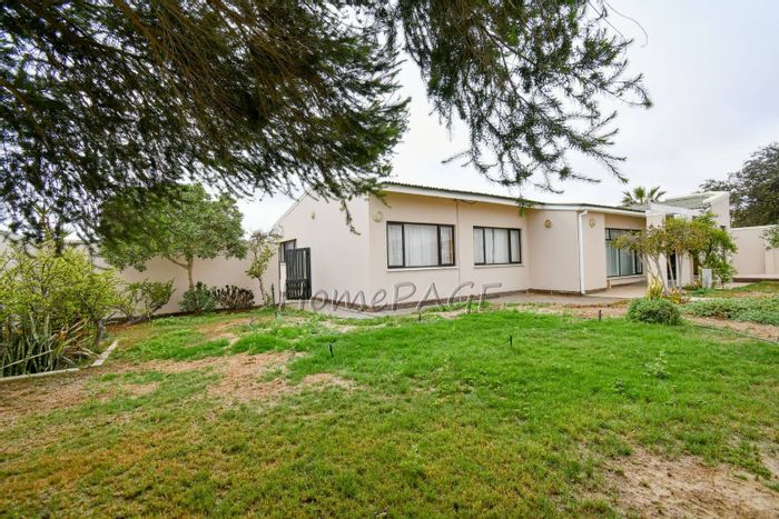 Walvis Bay Central House For Sale: 4 bedrooms, guest room, double garage, large garden.