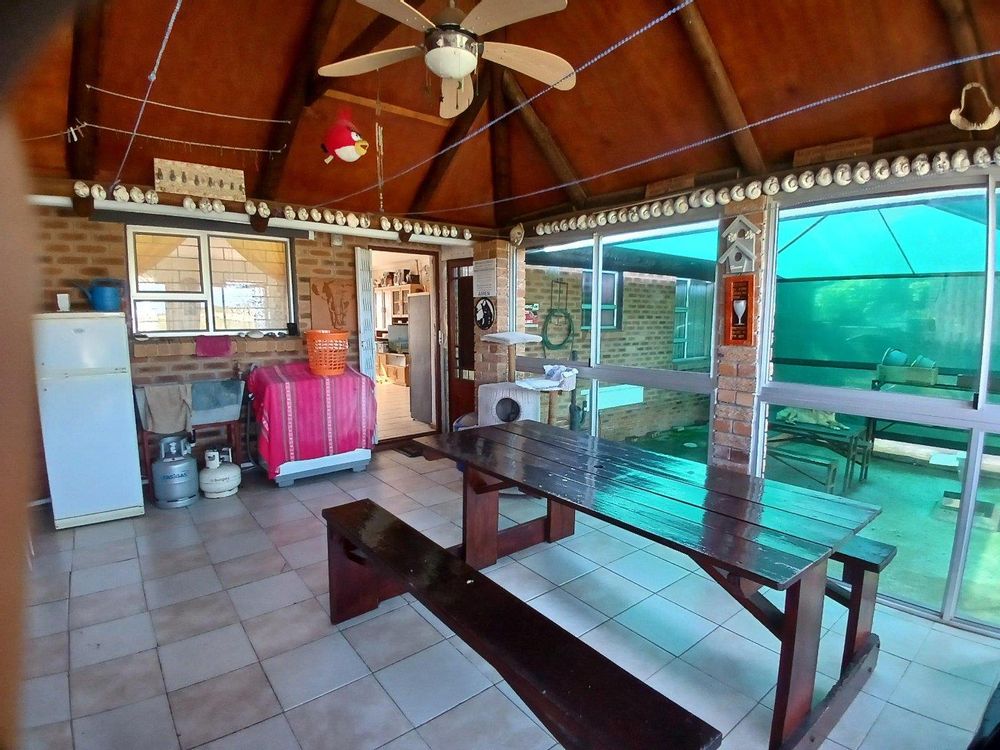 Same 2nd Living/BBQ Area; now in the opposite direction. Entrance to Kitchen at back.