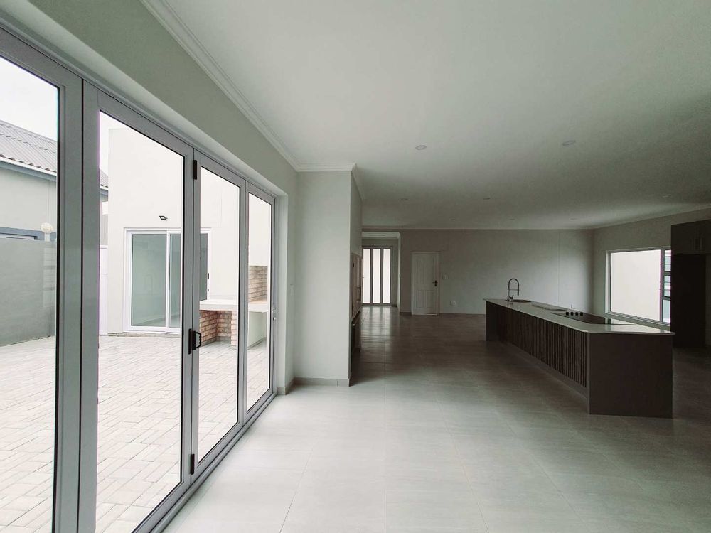 New Build House in Henties Bay Central with 3 Garages, Fireplace, and