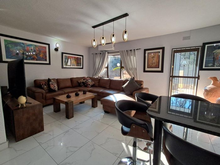 For Sale: Townhouse in Brackenhurst with 3 beds, private garden, and double garage.