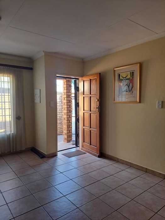3-Bedroom Townhouse To Rent in Montana Park with pool, garage, and garden.