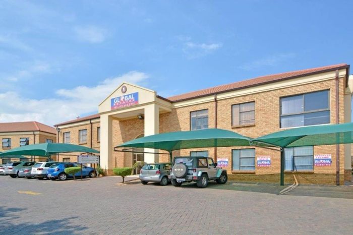 Mixed Use Property For Sale in Ruimsig: Office space with ample parking and security.