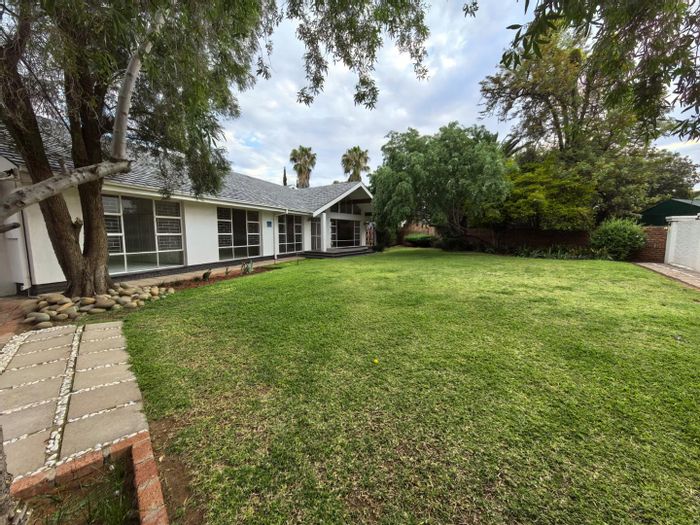 For Sale: Spacious Monument Heights house with pool, garden, and ample parking.
