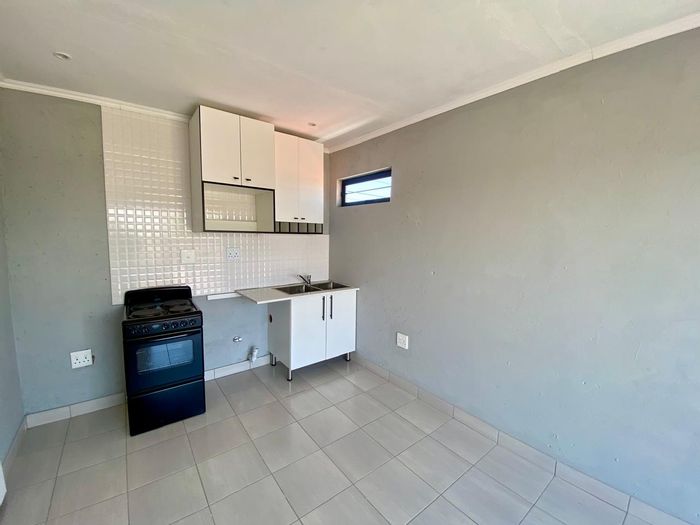 2-Bedroom Cottage To Rent in Goudrand with balcony and open-plan living.