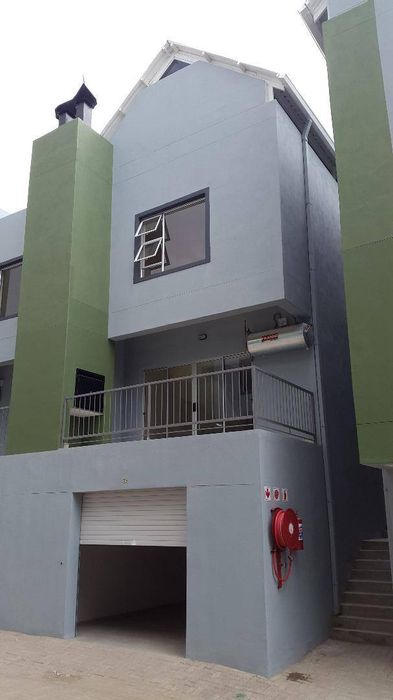 For Sale: Elisenheim Townhouse with 2 Bedrooms, Balcony, and Tandem Garage.