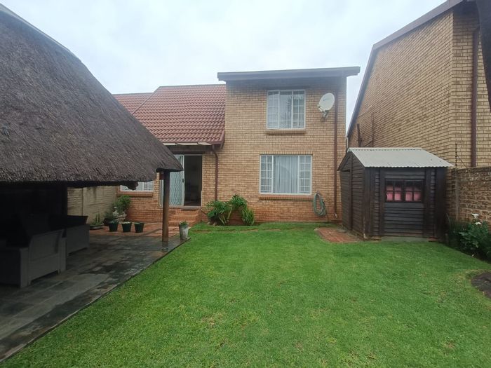 Hennopspark Townhouse For Sale: 3 bedrooms, private garden, secure complex amenities.