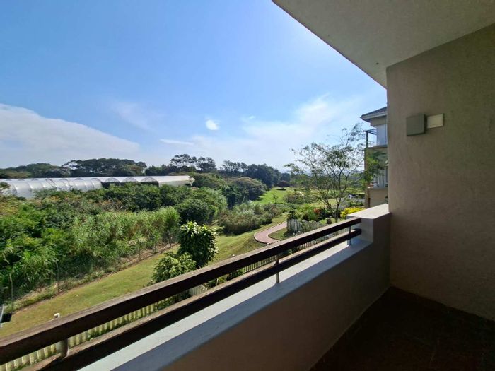Sheffield Beach Central Apartment To Rent: 2 beds, communal pool, gardens, and trails.