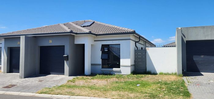 For Sale: House in West Riding with open plan living, outdoor braai, and garage.