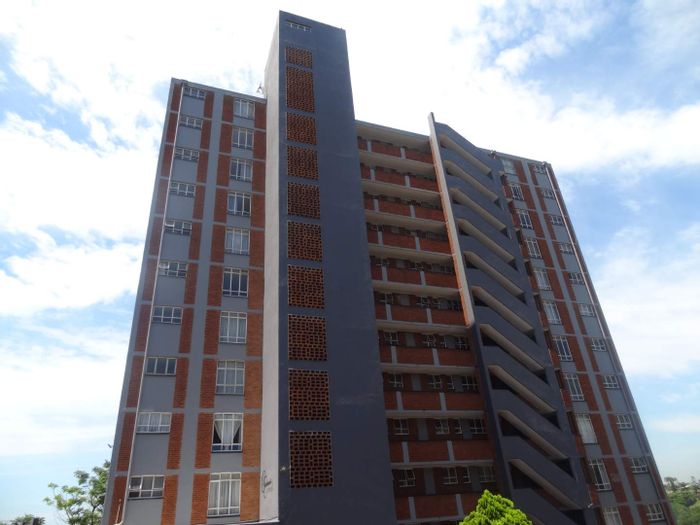 For Sale: Glenmore Apartment with pool access, parking, and enclosed balcony.