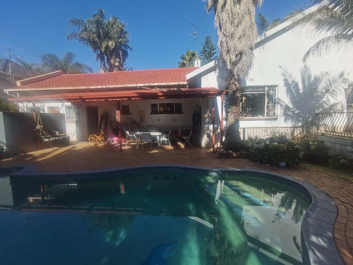 For Sale: House in Allen Grove with pool, garden cottage, and spacious living areas.