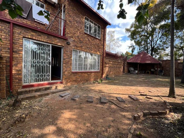 For Sale: Townhouse in Moreleta Park with garden, garage, and lapa.