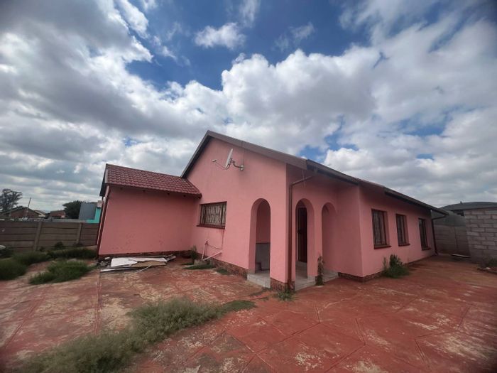 3-Bedroom House for Sale in Likole Ext 1 with Garage and Spacious Reception Areas.