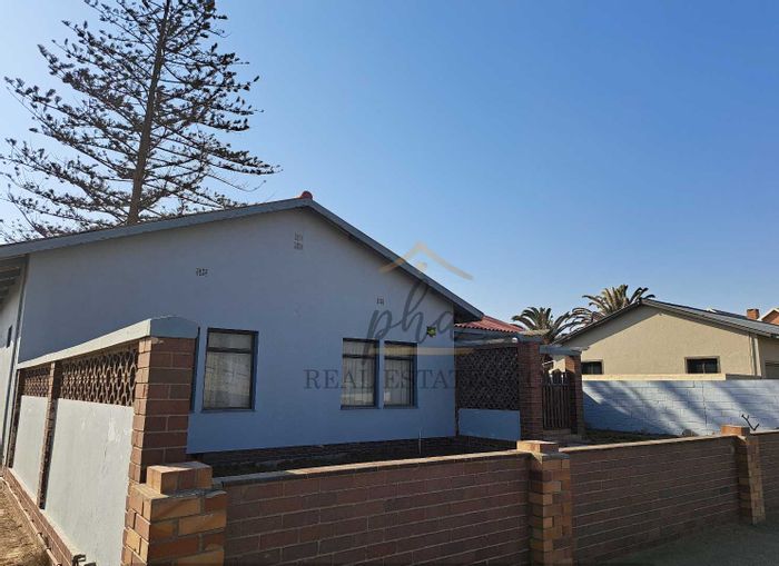 Walvis Bay Central House For Sale: 3 bedrooms, indoor BBQ, large yard, renovation potential.