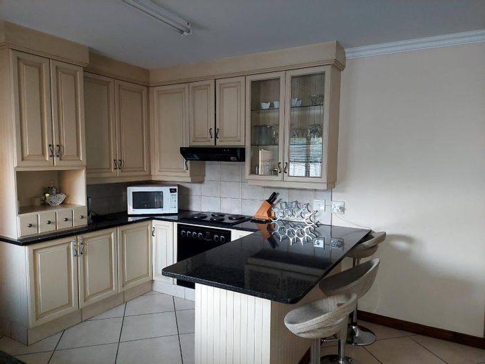 3-Bedroom House To Rent in Olympus AH with garden, double garage, and 24/7 security.