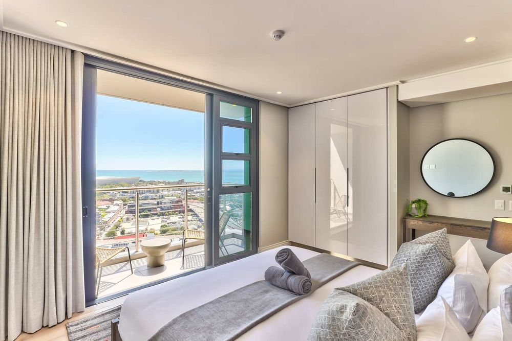 Main bedroom with ensuite bathroom and private balcony with Atlantic Ocean views