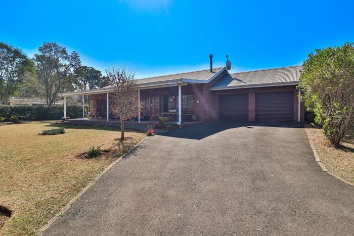 For Sale: Greendale Townhouse with garden, fireplace, double garage, and secure complex.