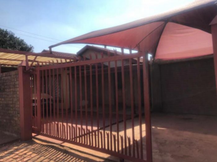 Two-bedroom house in Ga-Rankuwa for sale, featuring garage and carports.