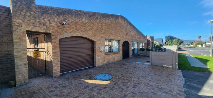 For Sale: Spacious Bothasig house with flatlet, garage, and ample parking.