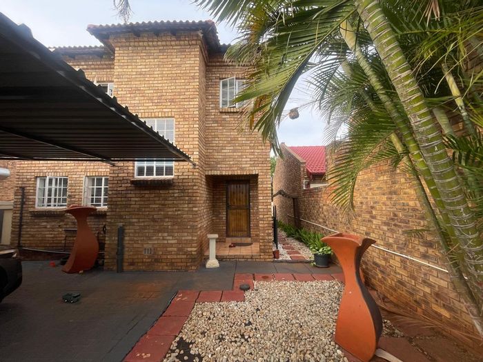 For Sale: Townhouse in Theresapark with 3 bedrooms, patio, and double carport.