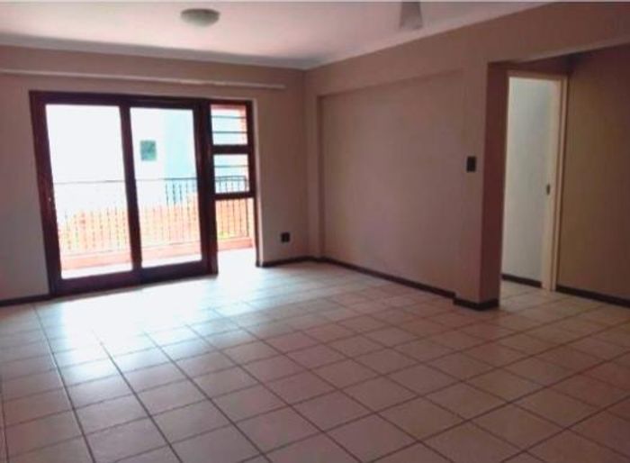 2-Bedroom Apartment To Rent in Bedfordview Central with balcony, pool access, and parking.