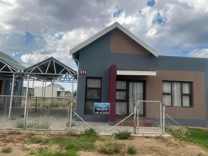 To Rent: House in Osona Village with 2 bedrooms, yard, and carport.