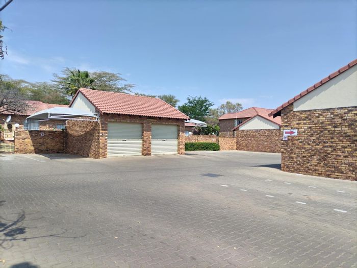House for Sale in Theresapark: 2 Bedrooms, Garage, Balcony, Secured Complex.