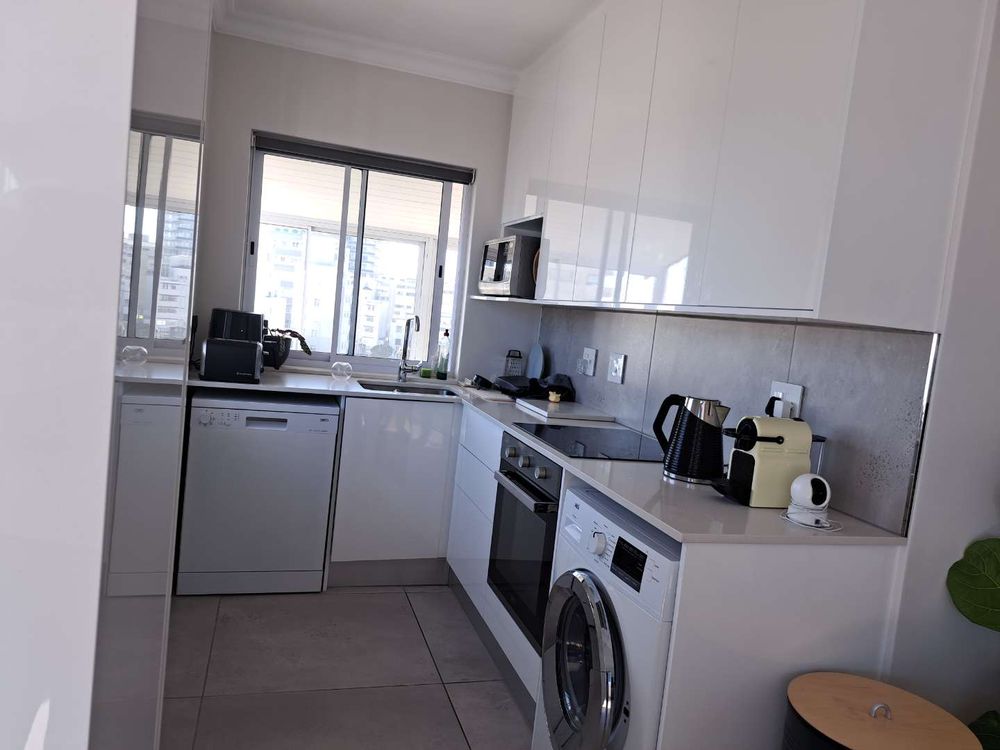 Kitchen with stove and plumbed for 2 appliances
