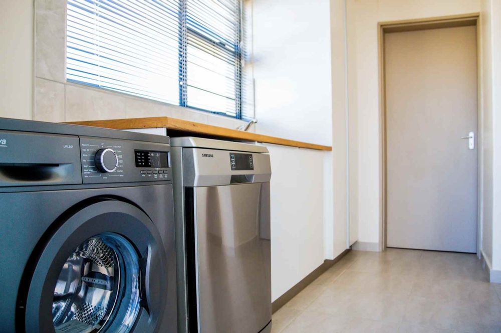 Kitchen scullery offering extra space and even more cupboards.