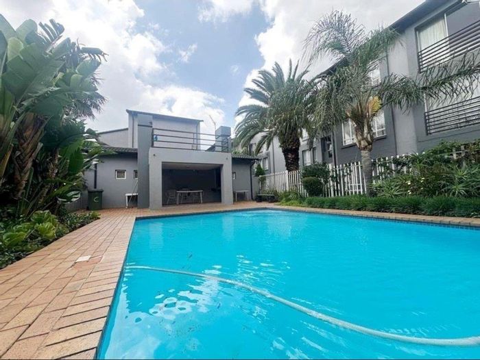 2-Bedroom Apartment For Sale in Verwoerdpark with pool and garden access.