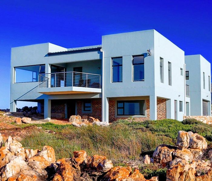 4-Bedroom House with Stunning Sea Views and Modern Amenities in Bettys Bay Central