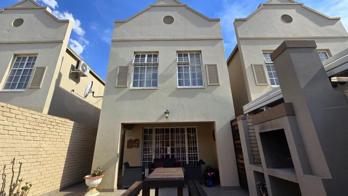 Townhouse for Sale in New Redruth: 3 bedrooms, private entertainment area, secure garage.