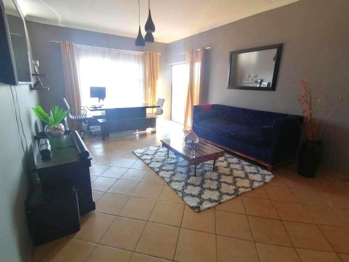 For Sale: Townhouse in Naturena with open-plan living, balcony, and 24hr security.
