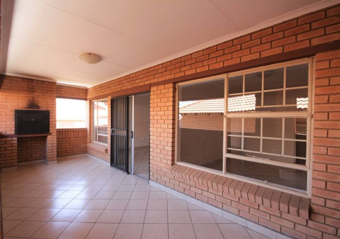 Hazeldean Apartment To Rent: 2-bed, 2-bath, pool access, secure parking, load-shedding-free.