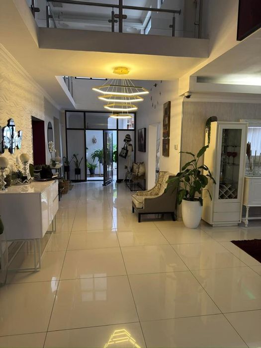 For Sale: House in Auasblick with pool, cinema, gym, and flats included.