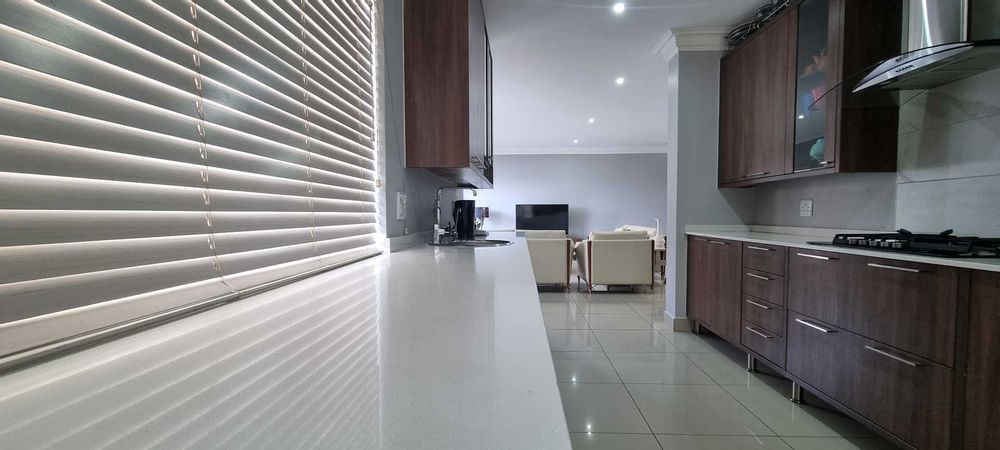 Modern kitchen with Caeserstone tops