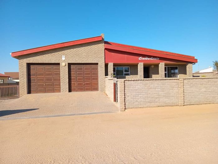 House for Sale in Henties Bay Central: 3 Bedrooms, Double Garage, Spacious Yard.