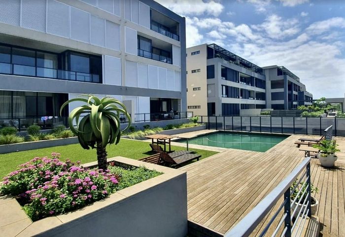 For Sale: Apartment in Umhlanga Central with pool, garden, and 24/7 security.