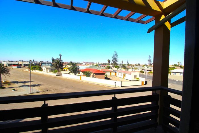 For Sale: Apartment in Swakopmund Central with rental income and dune views.