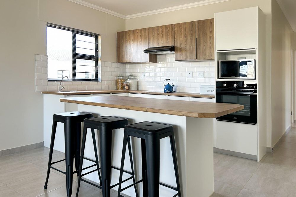 Modern kitchen island with scullery.