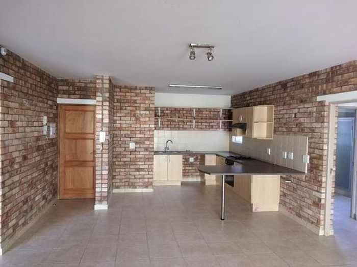 For Sale: 3 Bedroom Apartment in Windhoek Central with yard, parking, near Maerua Mall.