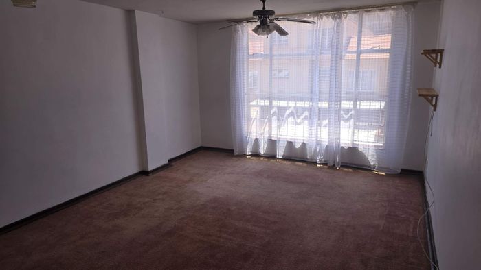 To Rent: 2-Bedroom Apartment in Wonderboom South with security and garage.